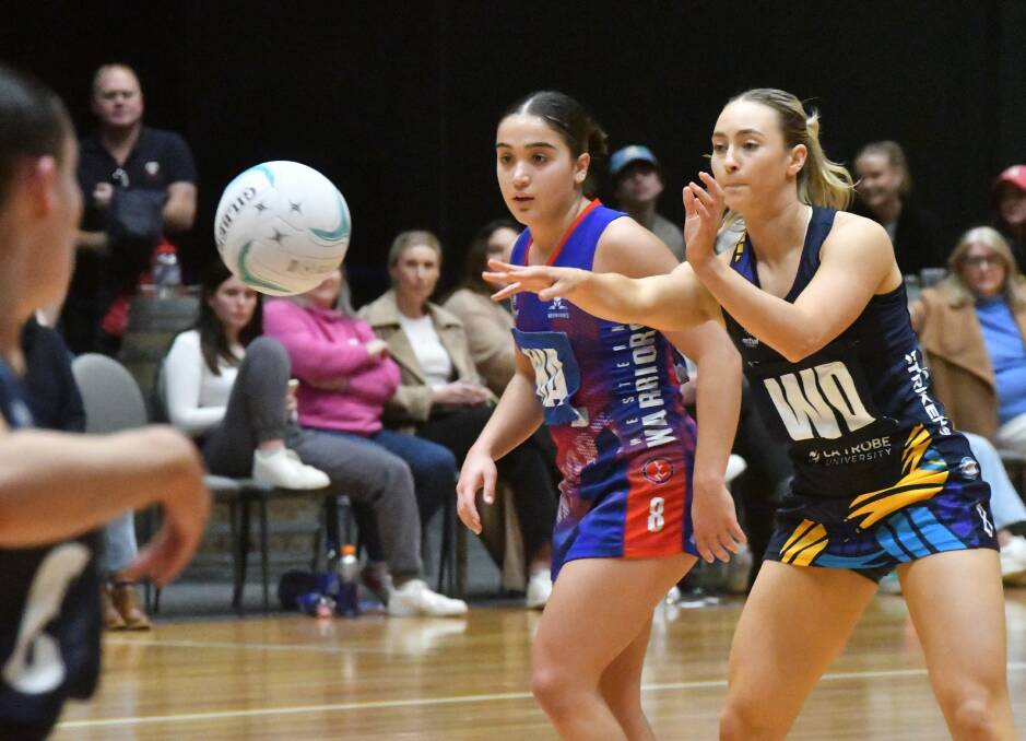 Milly Wicks back in her familiar role at wing defence in the Bendigo Strikers' 10-goal championship win over the Western Warriors last Sunday at Red Energy Arena. Picture by Adam Bourke