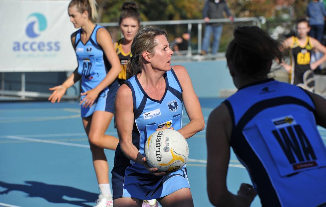 PLAYMAKER: Simone Foster gets play moving for Eaglehawk in Saturday's 36 goal victory over winless Kyneton at Canterbury Park. Picture: NONI HYETT