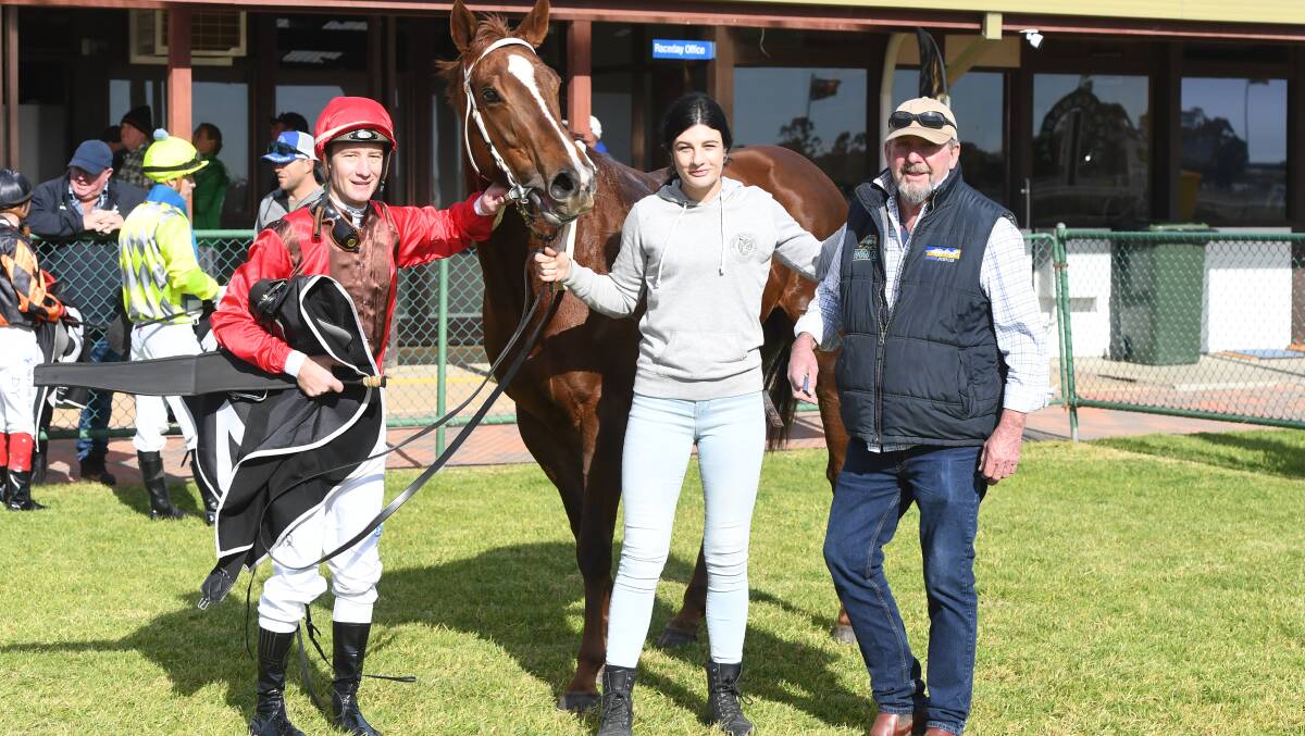 Jockey Jack Hill, strapper Shauna Roy and trainer Brendon Hearps with Enuffon following the mare's Warrackanabeal win. Picture by Brett Holburt/Racing Photos