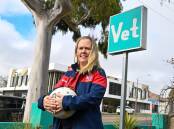 Calivil United legend Kellie Anset, pictured outside her work at Fur Life Vet in Long Gully, will play her 500th senior netball game for the Demons this Saturday. Picture by Enzo Tomasiello