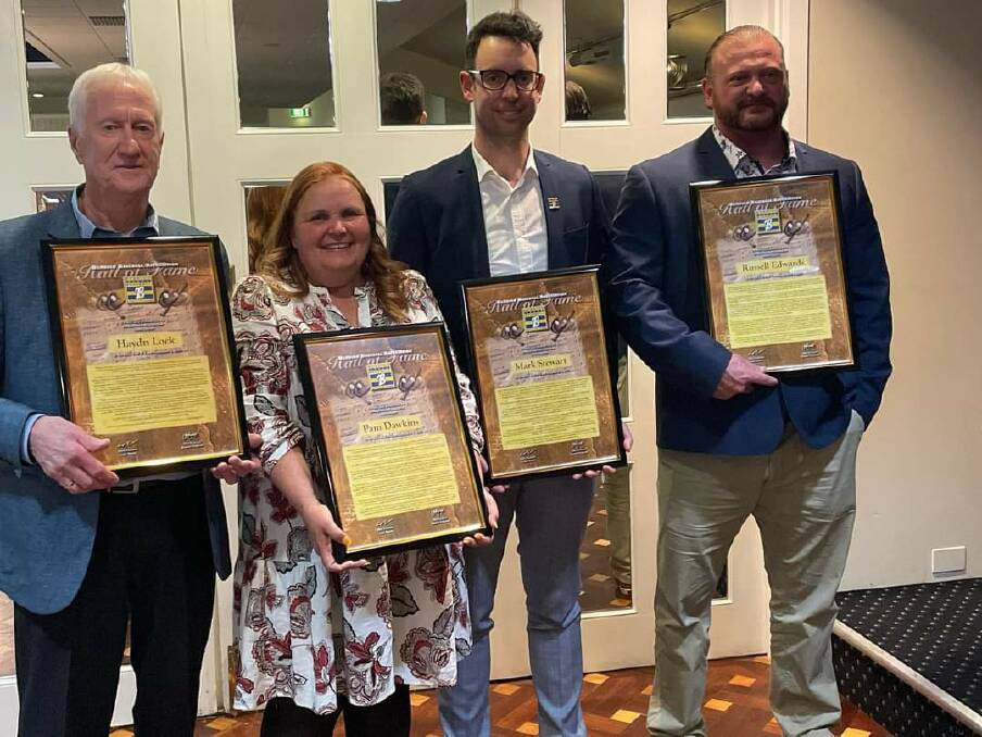 Haydn Lock, Pam Dawkins, Mark Stewart and John Edwards, who accepted the award on behalf of his father, john. Picture by BBA