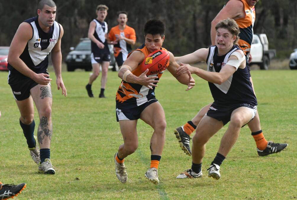 MGYCW midfielder Josh Worsley tries to win possession of the ball against Inglewood. Picture by Adam Bourke