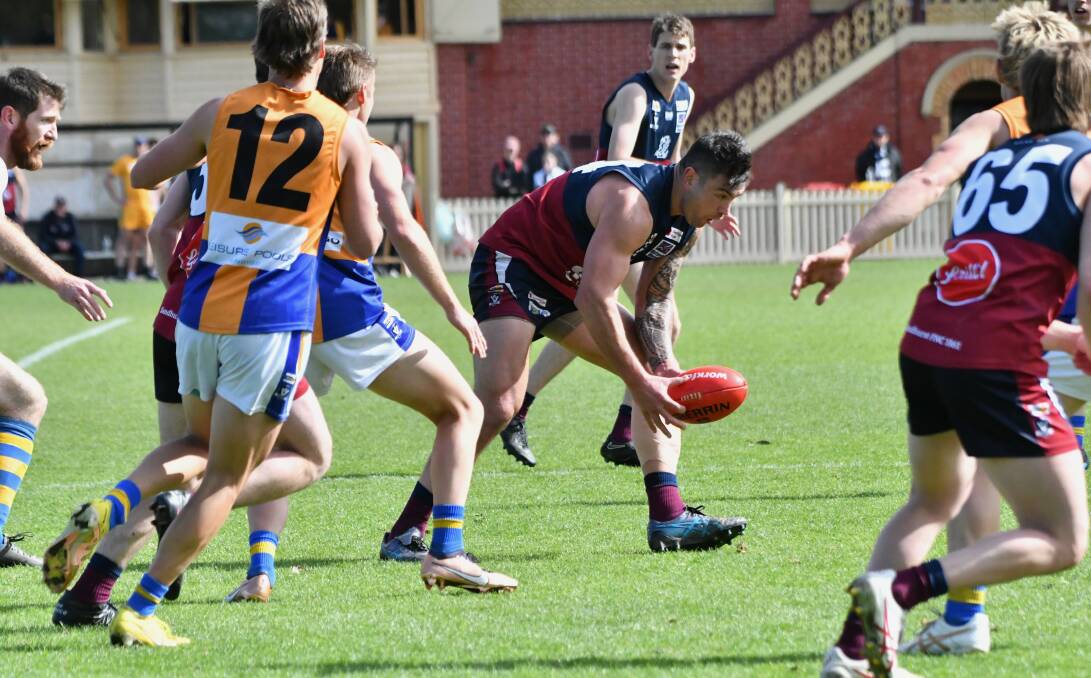 Sandhurst ruckman Hamish Hosking collects a loose ball.