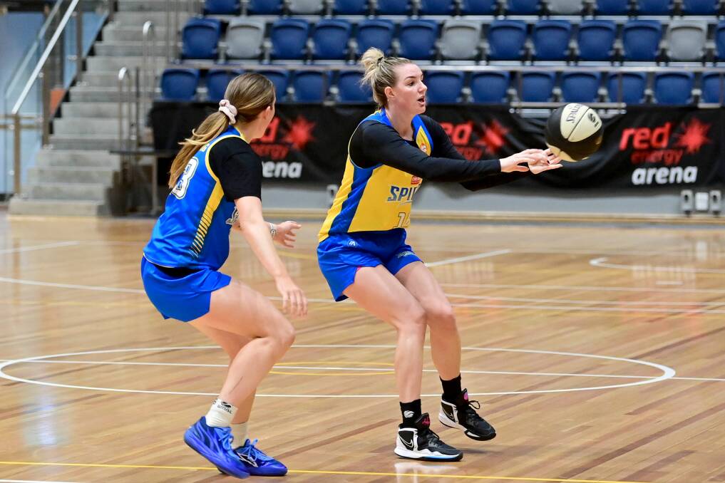 Casey Samuels passes to a team-mate during the Bendigo Spirit's training session on Thursday. Picture by Brendan McCarthy