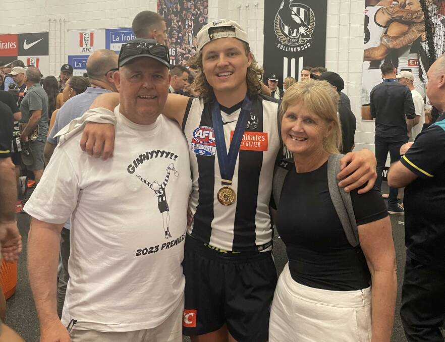 Proud parents Craig and Deb Ginnivan with their son Jack after Collingwood won the AFL grand final. Picture contributed