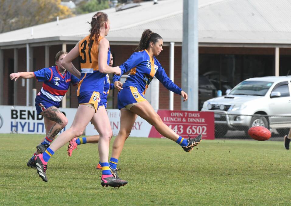 Paynton Jolliffe kicks one of her 13 goals for Golden Square in Sunday's big win over North Bendigo. Picture by Adam Bourke