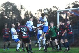 Strathdale players try to score for a corner in Saturday's night 2-2 draw with Epsom in League One Men action. Picture by Adam Bourke