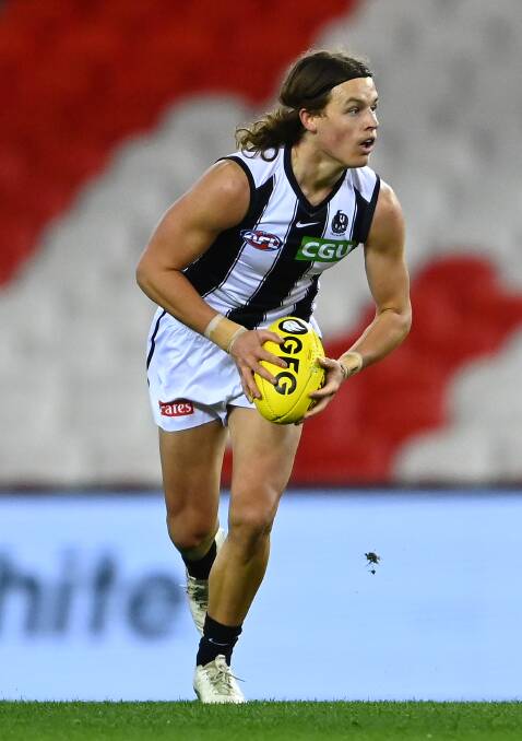 Jack Ginnivan in his first AFL match for Collingwood in 2021. Picture by Getty Images