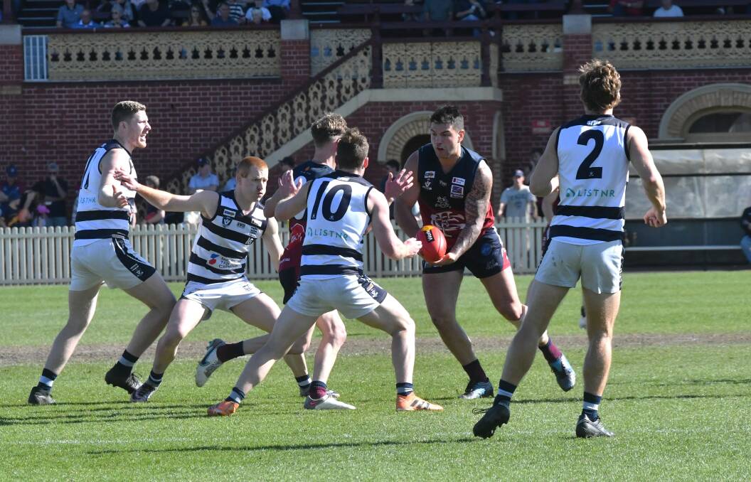 Sandhurst ruckman Hamish Hosking got the ball rolling for the Dragons in the preliminary final. Pictures by Adam Bourke