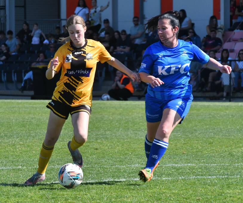 Teenager Zoe Cail goes on the attack. Cail suffered a leg injury late in normal time and was forced off the field.