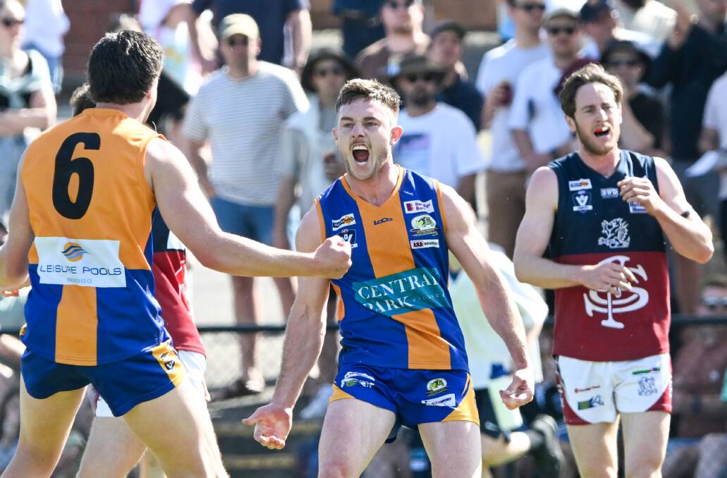 Golden Square's Tom Toma celebrates his first-quarter goal in Saturday's BFNL grand final win over Sandhurst at the QEO. Picture by Darren Howe