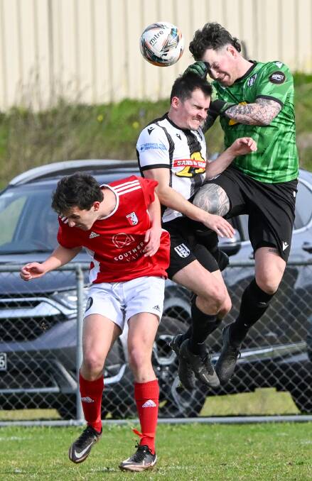 Players collide during the League Cup final between Shepparton South and Tatura. Picture by Darren Howe