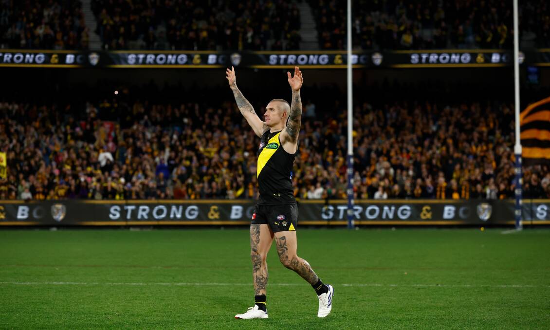 Dustin Martin thanks Richmond fans after his 300th AFL game on Saturday night at the MCG. Picture by Getty Images