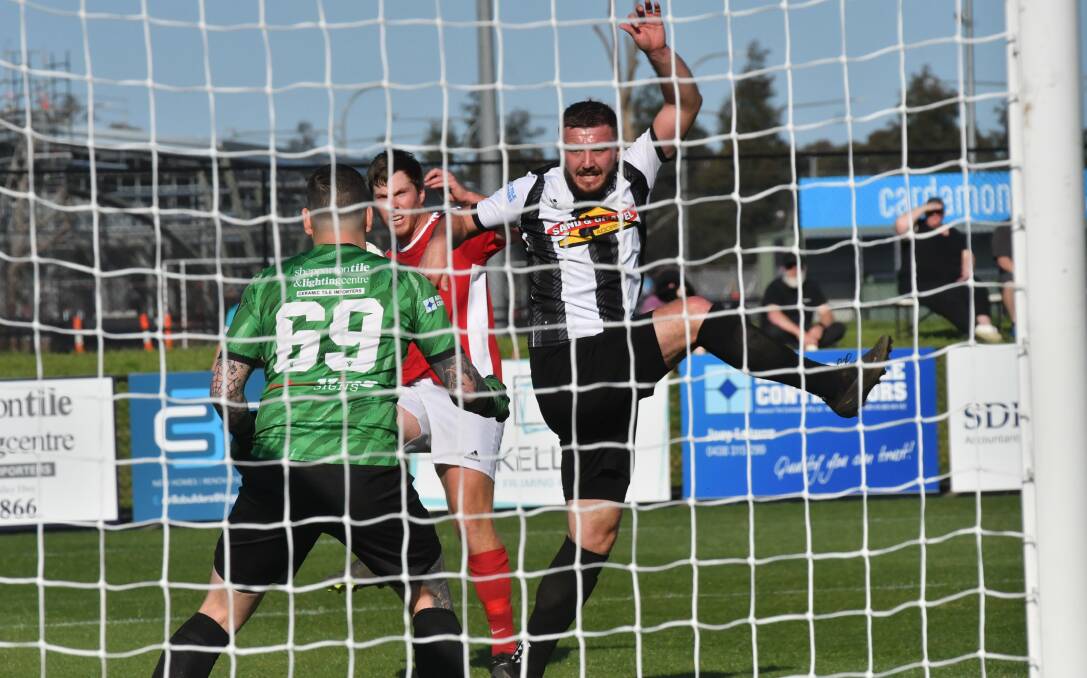 Thomas Leech's strike goes straight through the Shepparton South defence and into the back of the net. Picture by Adam Bourke
