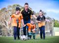 Strathfieldsaye Colts United's Phil Berry with his children Tyler, Bailey and Madison ahead of his 600th game for the club. Picture by Darren Howe