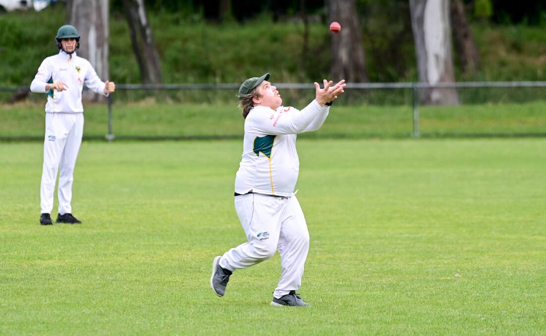 Jake Donegan takes a catch for Spring Gully.