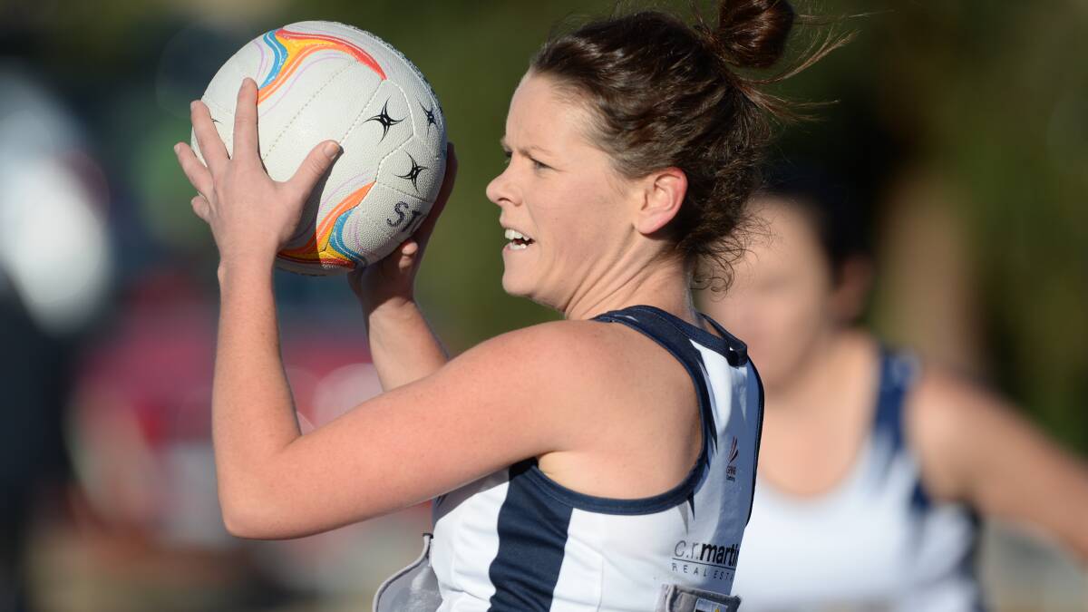 SAFE HANDS: Strathfieldsaye Storm goal attack Ashlee Barbetti was a key target on Saturday.