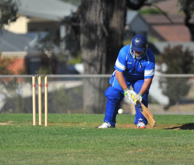 CONFIDENT: California Gully's Geoff West plays a reverse sweep against West Bendigo. Pictures: ADAM BOURKE