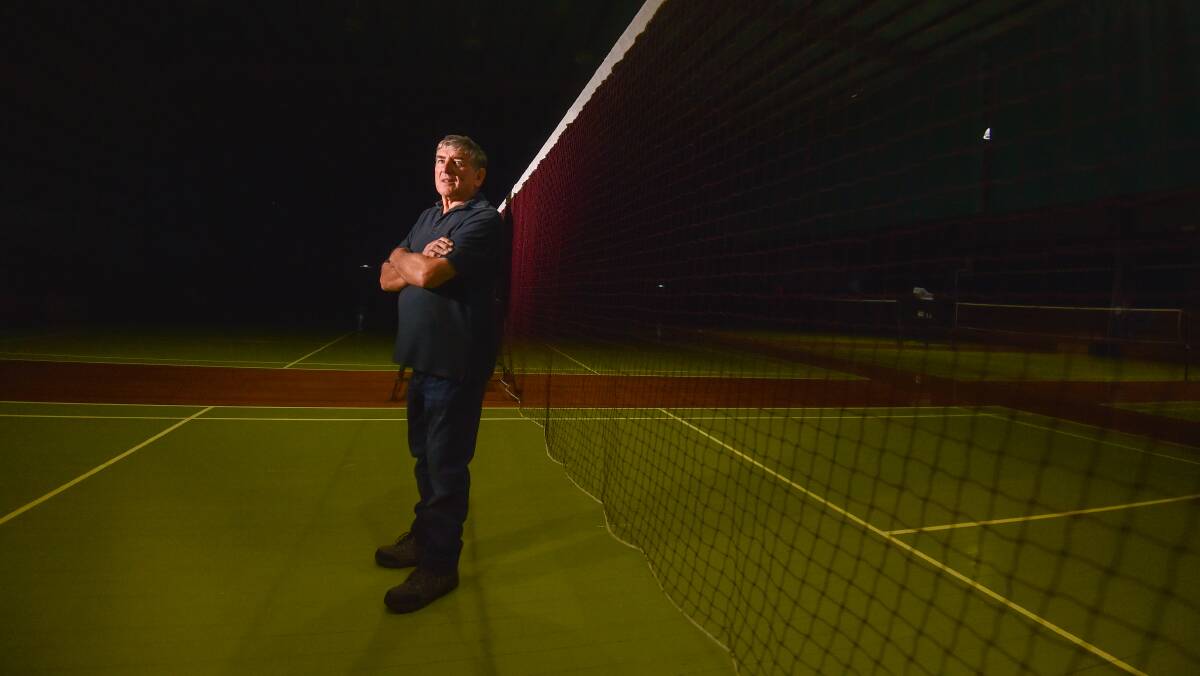 Badminton Victoria life member Robert O'Neill on one of the badminton courts he helped build at the Eaglehawk stadium. Picture by Darren Howe