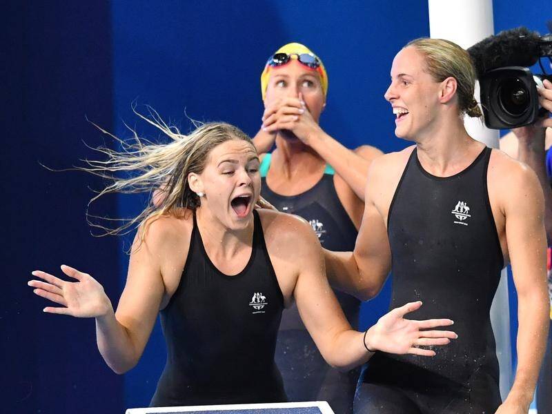 Shayna Jack, Emma McKeon, and Bronte Campbell celebrate Australia's 4x100m freestyle world record
