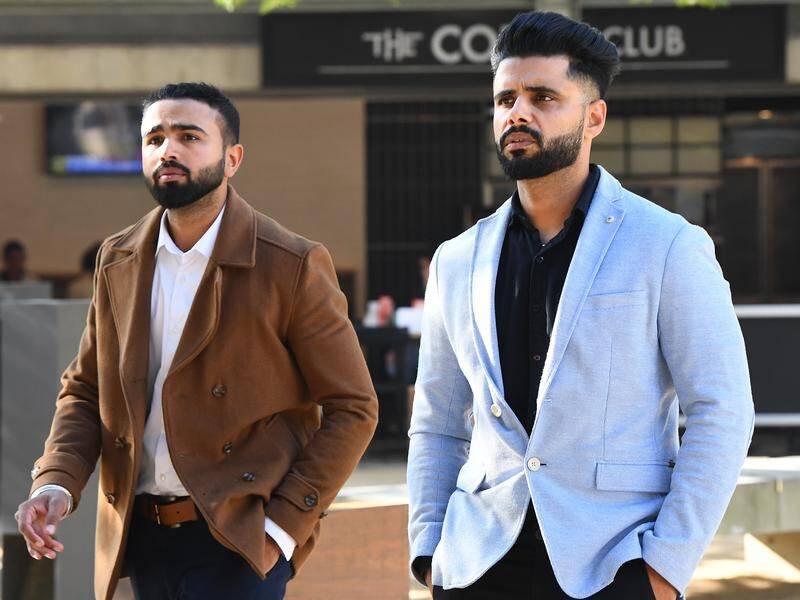 Dilpreet (left) and Manjinder Singh have been jailed after admitting to fraud charges. (Jono Searle/AAP PHOTOS)