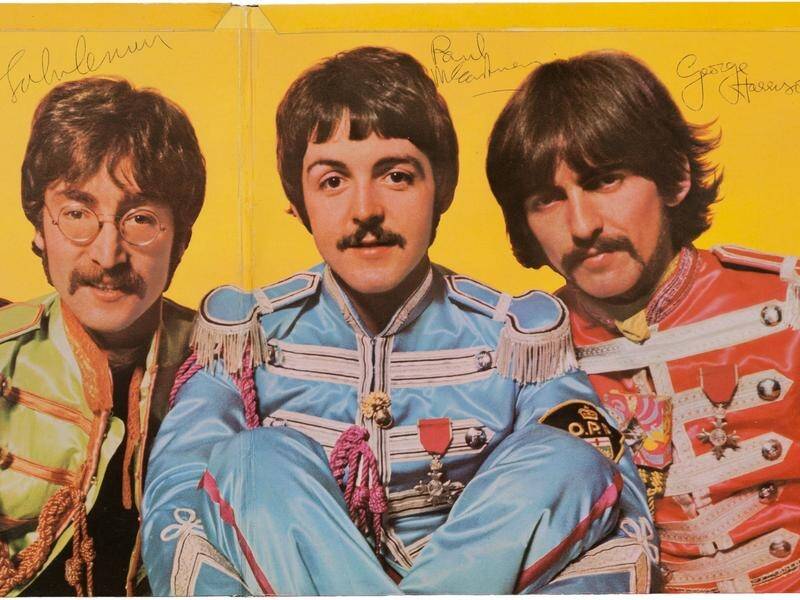 A photo from The Beatles' Sgt Pepper cover shoot is among the items going to auction. (AP PHOTO)