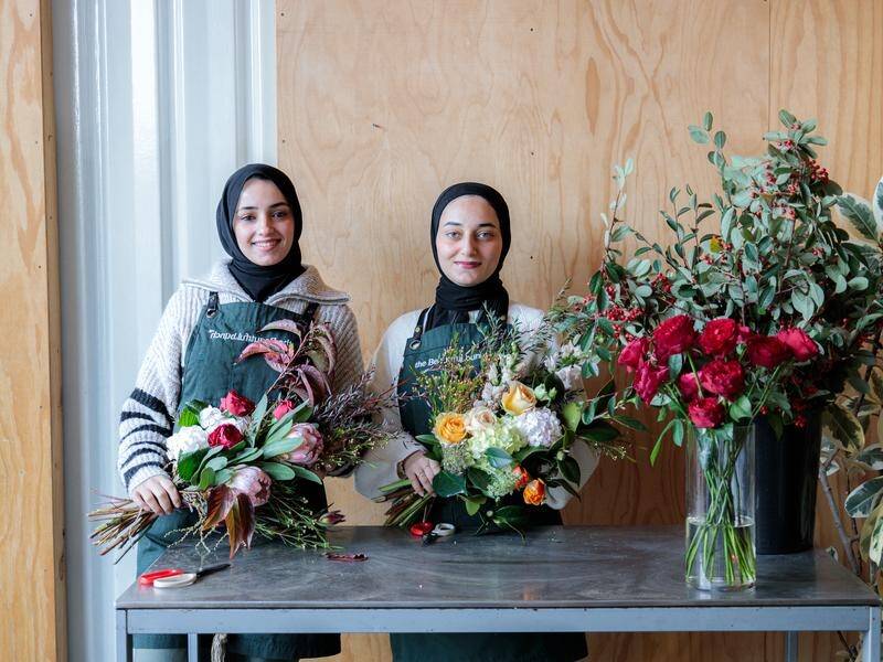 Gaza refugees Ola and Shatha have found flower arranging as a way to connect with people. (HANDOUT/THE BEAUTIFUL BUNCH)