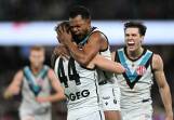 Port Adelaide have come from behind to score a stirring 14-point win over Carlton at Marvel Stadium. Photo: James Ross/AAP PHOTOS